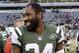 FILE - In this Jan. 1, 2017, file photo, New York Jets cornerback Darrelle Revis walks on the field after an NFL football game in East Rutherford, N.J. A judge on Wednesday, March 15, 2017, has dismissed all charges against former New York Jets cornerback Darrelle Revis stemming from a fight last month in Pittsburgh. Revis had been charged with aggravated assault and other counts from a fight Feb. 12 in which two men were punched and knocked out. (AP Photo/Seth Wenig, File)