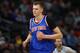 New York Knicks forward Kristaps Porzingis (6) in the second half of an NBA basketball game Saturday, Dec. 17, 2016, in Denver. The Nuggets won 127-114. (AP Photo/David Zalubowski)