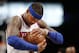 New York Knicks forward Carmelo Anthony rubs up the ball during pregame warmups before the start of an NBA basketball game against the Brooklyn Nets, Sunday, March 12, 2017, in New York. (AP Photo/Kathy Willens)