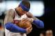 New York Knicks forward Carmelo Anthony rubs up the ball during pregame warmups before the start of an NBA basketball game against the Brooklyn Nets, Sunday, March 12, 2017, in New York. (AP Photo/Kathy Willens)