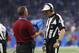Referee Walt Coleman reviews a play during the second half of an NFL football game between the Detroit Lions and the Atlanta Falcons, Sunday, Sept. 24, 2017, in Detroit. (AP Photo/Paul Sancya)