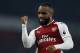 Arsenal's French striker Alexandre Lacazette celebrates scoring his team's second goal from the penalty spot during the English Premier League football match between Arsenal and West Bromwich Albion at the Emirates Stadium in London on September 25, 2017. / AFP PHOTO / Ian KINGTON / RESTRICTED TO EDITORIAL USE. No use with unauthorized audio, video, data, fixture lists, club/league logos or 'live' services. Online in-match use limited to 75 images, no video emulation. No use in betting, games or single club/league/player publications. / (Photo credit should read IAN KINGTON/AFP/Getty Images)