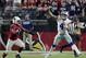 Dallas Cowboys quarterback Dak Prescott (4) throws as Arizona Cardinals outside linebacker Markus Golden (44) pursues during the second half of an NFL football game, Monday, Sept. 25, 2017, in Glendale, Ariz. (AP Photo/Rick Scuteri)