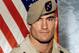 ** FILE ** Cpl. Pat Tillman is seen in a this 2003 file photo provided by Photography Plus. Just seven days after Pat Tillman's death, a top general warned there were strong indications that it was friendly fire and President Bush might embarrass himself if he said the NFL star-turned-soldier died in an ambush, according to a memo obtained by The Associated Press. (AP Photo/Photography Plus via Williamson Stealth Media Solutions, FILE)