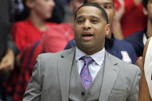FILE - In this Dec. 11, 2013, file photo, Arizona's assistant coach Emanuel Richardson watches from the sideline during the second half of an NCAA college basketball game against New Mexico State in Tucson, Ariz. Richardson was identified in court papers, and is among 10 people facing federal charges in Manhattan federal court, Tuesday, Sept. 26, 2017, in a wide probe of fraud and corruption in the NCAA, authorities said (AP Photo/John Miller, File)