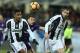 FLORENCE, ITALY - JANUARY 15: Alex Sandro (L) and Giorgio Chiellini of Juventus FC in action against Sebastian Cristoforo of ACF Fiorentina during the Serie A match between ACF Fiorentina and Juventus FC at Stadio Artemio Franchi on January 15, 2017 in Florence, Italy. (Photo by Gabriele Maltinti/Getty Images)
