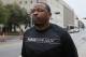 Lamont Evans, an assistant basketball coach at Oklahoma State University, leaves the federal courthouse following a court appearance in Oklahoma City, Wednesday, Sept. 27, 2017. Evans is facing federal charges in conjunction with a wide probe of fraud and corruption in the NCAA. (AP Photo/Sue Ogrocki)