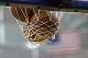 Basketballs sit stuck in the net before an NCAA college basketball game between Northern Iowa and North Carolina, Saturday, Nov. 21, 2015, in Cedar Falls, Iowa. (AP Photo/Charlie Neibergall)