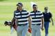 JERSEY CITY, NJ - SEPTEMBER 28: Justin Thomas of the U.S. Team and Rickie Fowler of the U.S. Team walk on the eighth hole during Thursday foursome matches of the Presidents Cup at Liberty National Golf Club on September 28, 2017 in Jersey City, New Jersey. (Photo by Rob Carr/Getty Images)