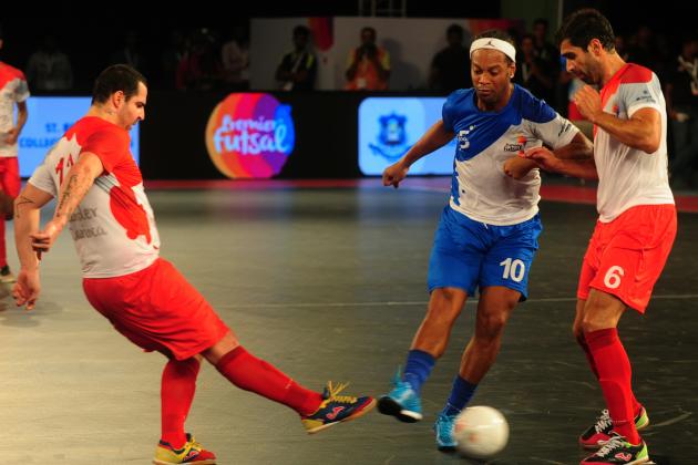Ronaldhino (2R) from the Goa 5's plays against Kolkata 5's during their Premier Futsal Football League match in Chennai on July 15, 2016. / AFP / ARUN SANKAR (Photo credit should read ARUN SANKAR/AFP/Getty Images)