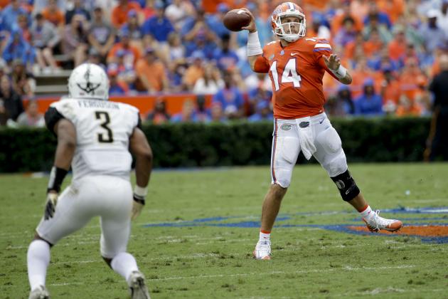Florida quarterback Luke Del Rio (14) throws a pass as he is pressured by Vanderbilt cornerback Taurean Ferguson (3) during the first half of an NCAA college football game, Saturday, Sept. 30, 2017, in Gainesville, Fla. (AP Photo/John Raoux)