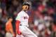 BOSTON, MA - SEPTEMBER 30: Mookie Betts #30 of the Boston Red Sox reacts as he rounds the bases after hitting a solo home run during the seventh inning of a game against the Houston Astros on September 30, 2017 at Fenway Park in Boston, Massachusetts. (Photo by Billie Weiss/Boston Red Sox/Getty Images)
