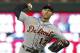 Detroit Tigers' Andrew Romine pitches against the Minnesota Twins during the eighth inning of a baseball game Saturday, Sept. 30, 2017, in Minneapolis. Romine joined a select few players by playing in all nine positions during the game. The Tigers won 3-2. (AP Photo/Jim Mone)