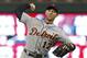 Detroit Tigers' Andrew Romine pitches against the Minnesota Twins during the eighth inning of a baseball game Saturday, Sept. 30, 2017, in Minneapolis. Romine joined a select few players by playing in all nine positions during the game. The Tigers won 3-2. (AP Photo/Jim Mone)