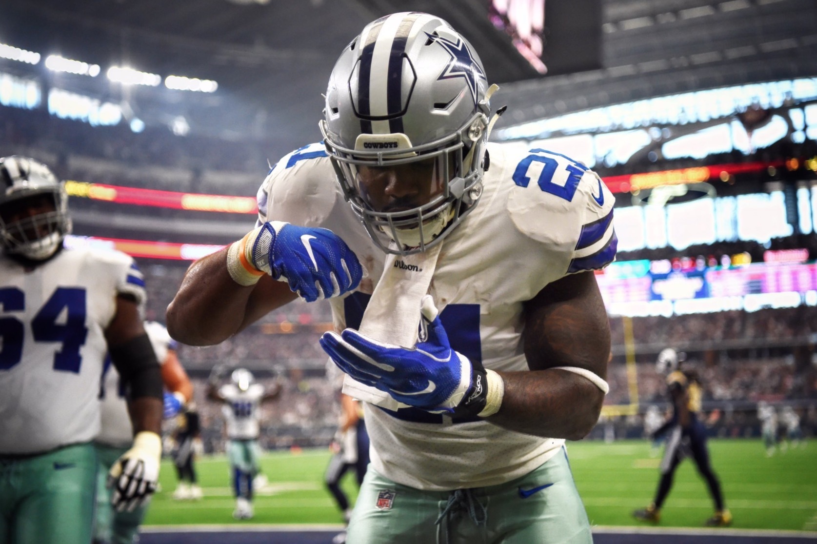 Cowboys Running Back Ezekiel Elliot pretending to eat a bowl cereal after a play. "pictured here"