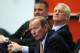 Denver Broncos owner Pat Bowlen, front, joins head coach John Fox, center, and general manager Brian Xanders in listening as quarterback Peyton Manning addreses reporters during a news conference at the team's headquarters in Englewood, Colo., on Tuesday, March 20, 2012. (AP Photo/David Zalubowski)