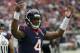 HOUSTON, TX - OCTOBER 01: Deshaun Watson #4 of the Houston Texans pumps up the crowd after a touchdown pass to DeAndre Hopkins #10 in the first quarter against the Tennessee Titans at NRG Stadium on October 1, 2017 in Houston, Texas. (Photo by Bob Levey/Getty Images)