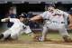 New York Yankees left fielder Brett Gardner (11) reacts after he was tagged out at the plate by Minnesota Twins catcher Chris Gimenez (38) during the seventh inning of a baseball game in New York, Tuesday, Sept. 19, 2017. The play came after the Yankees' Aaron Judge hit into a fielder's choice. (AP Photo/Kathy Willens)