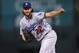 Los Angeles Dodgers starting pitcher Clayton Kershaw delivers a pitch to Colorado Rockies' Charlie Blackmon in the first inning of a baseball game Saturday, Sept. 30, 2017, in Denver. (AP Photo/David Zalubowski)