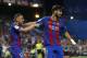 Barcelona's Paco Alcacer, left, celebrates with team mate Barcelona's Andre Gomes after scoring his team's third goal during the Copa del Rey final soccer match between Barcelona and Alaves at the Vicente Calderon stadium in Madrid, Spain, Saturday May 27, 2017. (AP Photo/Daniel Ochoa de Olza)