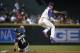 Arizona Diamondbacks' Ketel Marte, right, leaps over Colorado Rockies' Tony Wolters (14) after being forced out at second base during the sixth inning of a baseball game Thursday, Sept. 14, 2017, in Phoenix. The Diamondbacks defeated the Rockies 7-0. (AP Photo/Ross D. Franklin)