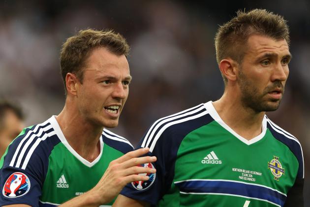 PARIS, FRANCE - JUNE 21: Jonny Evans (L) and Gareth McAuley of Northern Ireland react during the UEFA EURO 2016 Group C match between Northern Ireland and Germany at Parc des Princes on June 21, 2016 in Paris, France. (Photo by Matthew Ashton - AMA/Getty Images)