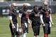 San Francisco 49ers quarterbacks Nick Mullen, left, Brian Hoyer (2) and C.J. Beathard (3) during the team's organized team activity at its NFL football training facility Tuesday, May 23, 2017, in Santa Clara, Calif. (AP Photo/Marcio Jose Sanchez)