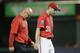 Washington Nationals starting pitcher Max Scherzer, right, walks to the dugout with Director of Athletic Training Paul Lessard, left, after being pulled in the fourth inning of a baseball game against the Pittsburgh Pirates, Saturday, Sept. 30, 2017, in Washington. (AP Photo/Mark Tenally)