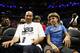 LOS ANGELES, CA - AUGUST 13: (L-R) Lavar Ball and LaMelo Ball look on from the audience during week eight of the BIG3 three on three basketball league at Staples Center on August 13, 2017 in Los Angeles, California. (Photo by Sean M. Haffey/Getty Images)
