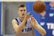 New York Knicks' Kristaps Porzingis passes during NBA basketball practice in Greenburgh, N.Y., Tuesday, Sept. 26, 2017. (AP Photo/Seth Wenig)