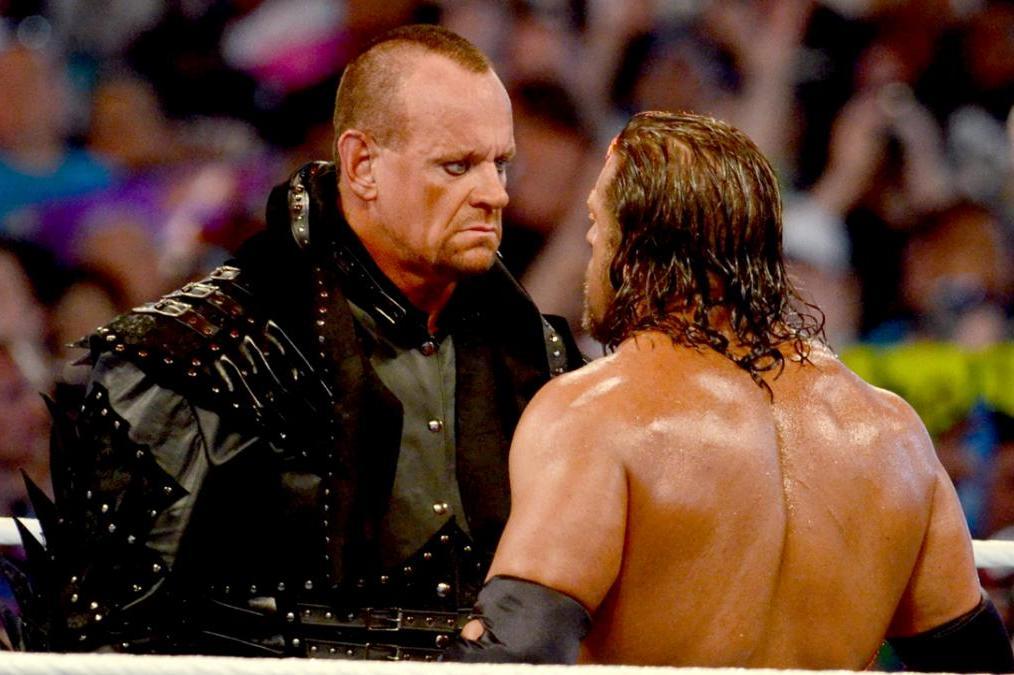 Triple H vs. Undertaker: Who Is the Greatest WWE Hell in a Cell Performer?