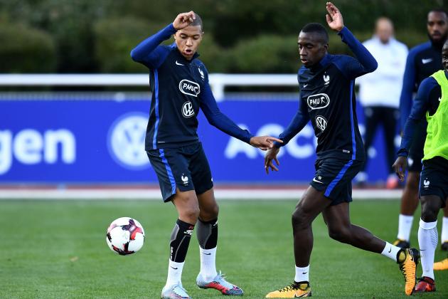 France's forward Kylian Mbappe (L) and France's midfielder Blaise Matuidi attend a training session in Clairefontaine-en-Yvelines on October 3, 2017, in preparation for the team's World Cup 2018 qualifying football match against Bulgaria.  / AFP PHOTO / FRANCK FIFE        (Photo credit should read FRANCK FIFE/AFP/Getty Images)