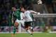 BELFAST, NORTHERN IRELAND - OCTOBER 05: Josh Magennis of Northern Ireland competes with Marvin Plattenhardt of Germany during the FIFA 2018 World Cup Qualifier between Northern Ireland and Germany at Windsor Park on October 5, 2017 in Belfast, Northern Ireland. (Photo by Matthew Ashton - AMA/Getty Images)