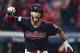 Cleveland Indians' Yan Gomes celebrates after hitting a game-winning single off New York Yankees relief pitcher Dellin Betances in the 13th inning of Game 2 of a baseball American League Division Series, Friday, Oct. 6, 2017, in Cleveland. Austin Jackson scored on the play. The Indians won 9-8. (AP Photo/David Dermer)