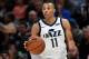 SALT LAKE CITY, UT - OCTOBER 4: Dante Exum #11 of the Utah Jazz controls the ball against the Maccabi Haifa in preseason action at Vivint Smart Home Arena on October 4, 2017 in Salt Lake City, Utah. NOTE TO USER: User expressly acknowledges and agrees that, by downloading and or using this photograph, User is consenting to the terms and conditions of the Getty Images License Agreement. (Photo by Gene Sweeney Jr./Getty Images)