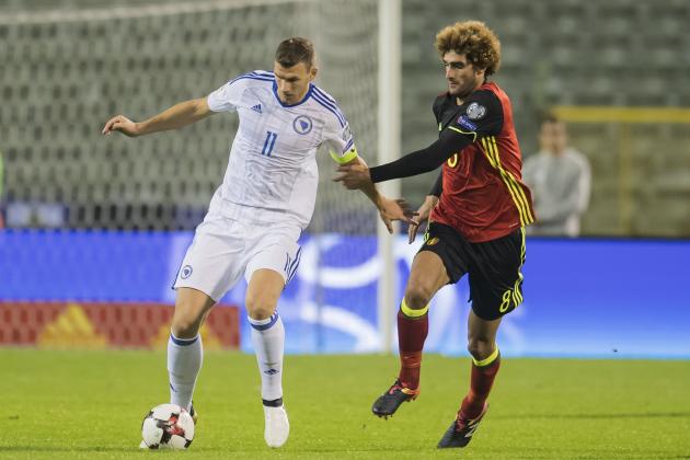 (L-R) Edin Dzeko of Bosnia and Herzegovina, Marouane Fellaini of Belgiumduring the FIFA World Cup 2018 qualifying match between Belgium and Bosnie Herzegowina on October 07, 2016 at the Koning Boudewijn stadium in Brussels, Belgium.(Photo by VI Images via Getty Images)