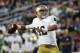 Notre Dame's Ian Book (12) passes during the second half of an NCAA college football game against Boston College in Boston, Saturday, Sept. 16, 2017. Notre Dame won 49-20. (AP Photo/Michael Dwyer)