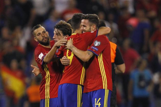 Spain's Saul Niguez, right, celebrates with teammate Aritz Aduriz at the end of the World Cup Group G qualifying soccer match between Spain and Albania at the Rico Perez stadium in Alicante, Spain, Friday, Oct. 6, 2017. Spain won 3-0 and qualified for the 2018 tournament finals. (AP Photo/Alberto Saiz)