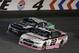 Ryan Blaney (22) races Daniel Suarez (18) out of Turn 4 during an Xfinity Series auto race at Charlotte Motor Speedway in Concord, N.C., Saturday, Oct. 7, 2017. (AP Photo/Chuck Burton)
