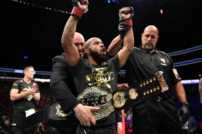 LAS VEGAS, NV - OCTOBER 07: Demetrious Johnson celebrates after his submission victory over Ray Borg in their UFC flyweight championship bout during the UFC 216 event inside T-Mobile Arena on October 7, 2017 in Las Vegas, Nevada. (Photo by Jeff Bottari/Zuffa LLC/Zuffa LLC via Getty Images)