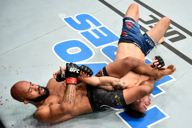 LAS VEGAS, NV - OCTOBER 07: Demetrious Johnson secures an arm bar submission against Ray Borg in their UFC flyweight championship bout during the UFC 216 event inside T-Mobile Arena on October 7, 2017 in Las Vegas, Nevada. (Photo by Jeff Bottari/Zuffa LLC/Zuffa LLC via Getty Images)