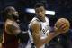 Milwaukee Bucks' Giannis Antetokounmpo is defended by Cleveland Cavaliers' LeBron James during an NBA basketball game Tuesday, Nov. 29, 2016, in Milwaukee. (AP Photo/Aaron Gash)