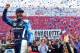 CHARLOTTE, NC - OCTOBER 08: Martin Truex Jr, driver of the #78 Auto-Owners Insurance Toyota, celebrates in victory lane after winning the Monster Energy NASCAR Cup Series Bank of America 500 at Charlotte Motor Speedway on October 8, 2017 in Charlotte, North Carolina. (Photo by Jared C. Tilton/Getty Images)