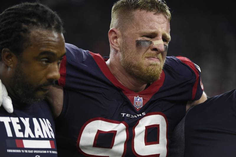 Houston Texans defensive end J.J. Watt (99) is helped off the field after he was injured during the first half of an NFL football game against the Kansas City Chiefs, Sunday, Oct. 8, 2017, in Houston. (AP Photo/Eric Christian Smith)