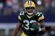 ARLINGTON, TX - OCTOBER 08: Aaron Jones #33 of the Green Bay Packers runs the ball against the Dallas Cowboys in the fourth quarter at AT&T Stadium on October 8, 2017 in Arlington, Texas. (Photo by Ronald Martinez/Getty Images)