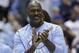 Former North Carolina basketball player Michael Jordan applauds during a half-time presentation in an NCAA college basketball game between North Carolina and Duke in Chapel Hill, N.C., Saturday, March 4, 2017. North Carolina won 90-83. (AP Photo/Gerry Broome)