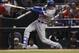 Los Angeles Dodgers' Cody Bellinger connects for a solo home run during the fifth inning of game 3 of baseball's National League Division Series against the Arizona Diamondbacks, Monday, Oct. 9, 2017, in Phoenix. (AP Photo/Rick Scuteri)