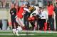 COLUMBUS, OH - OCTOBER 7: Denzel Ward #12 of the Ohio State Buckeyes hits Taivon Jacobs #12 of the Maryland Terrapins after a reception in the first quarter at Ohio Stadium on October 7, 2017 in Columbus, Ohio. Ward was ejected from the game after being assessed a targeting penalty for the hit. (Photo by Jamie Sabau/Getty Images)