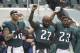 Philadelphia Eagles' Chris Long (56), Malcolm Jenkins (27) and Rodney McLeod (23) gesture during the National Anthem before an NFL football game against the Arizona Cardinals, Sunday, Oct. 8, 2017, in Philadelphia. (AP Photo/Matt Rourke)