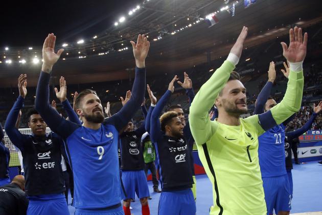 France's goalkeeper Hugo†Lloris, right, celebrates with teammates at the end of the World Cup Group A qualifying soccer match between France and Belarus at the Stade de France stadium in Saint-Denis, outside Paris, Tuesday, Oct.10, 2017. Antoine Griezmann scored one goal and made the other as France beat Belarus 2-1 to qualify for next year's World Cup. (AP Photo/Michel Euler)